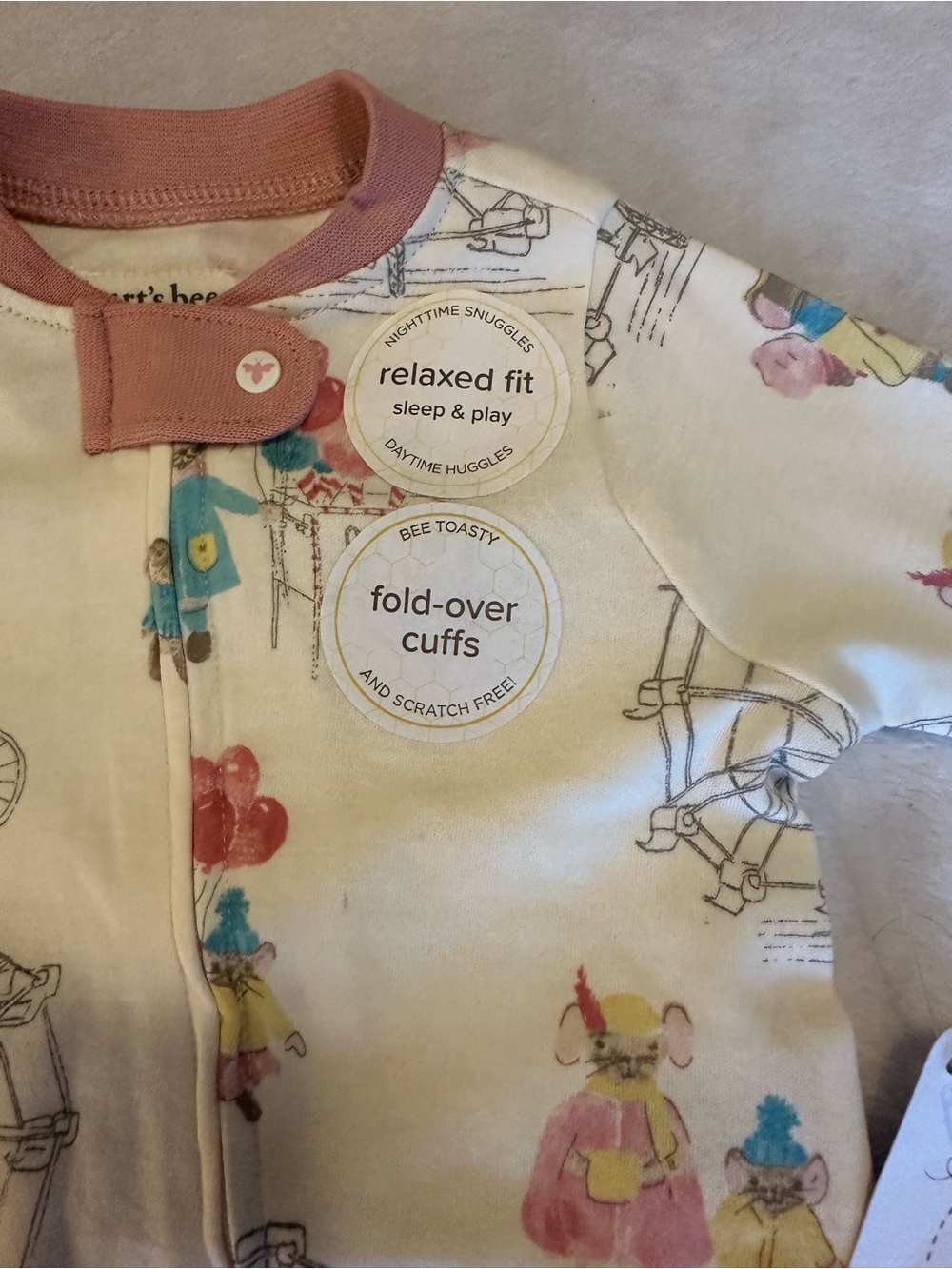 Burt's Bees Cream One-Piece Footie with Pink Trim and Multicolor Print
